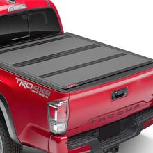 Toyota Tacoma | Hard Folding Tonneau Cover by Cap-it