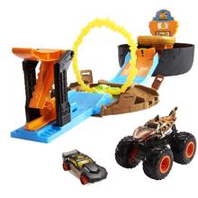 Hot Wheels Monster Trucks Stunt Tire Play Set With Launcher, 1 Hot Wheels 1:64 Scale Car & 1 Monster Truck by Mattel